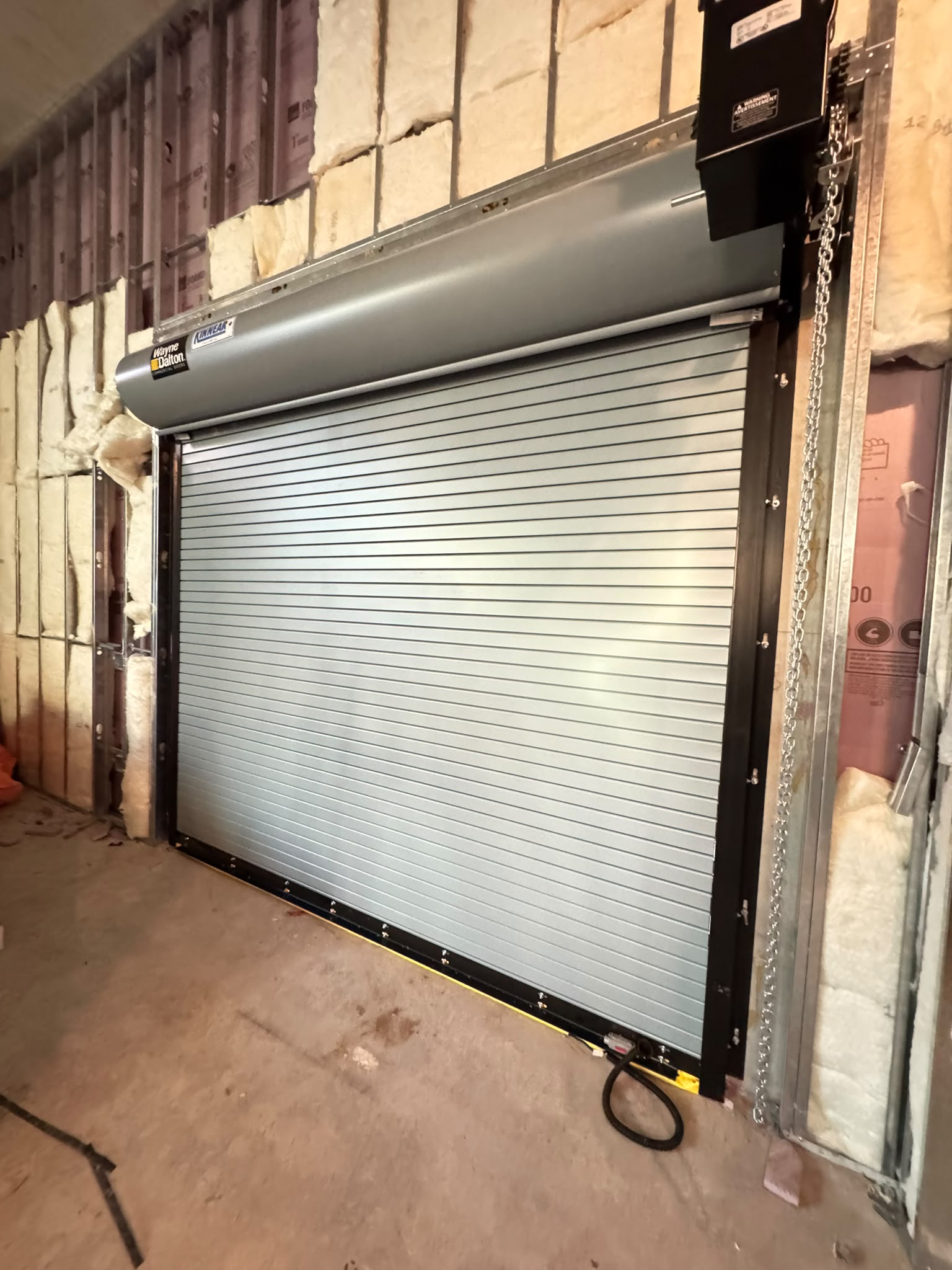 Insulated commercial roll-up door install
