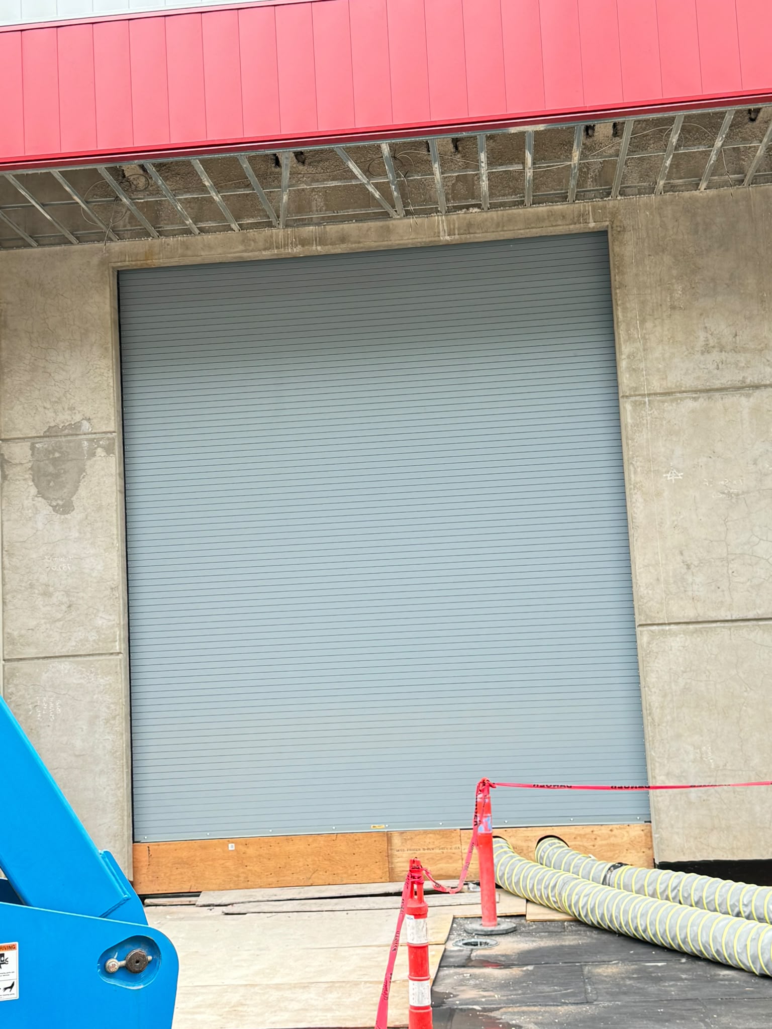 Exterior loading-dock overhead door install
